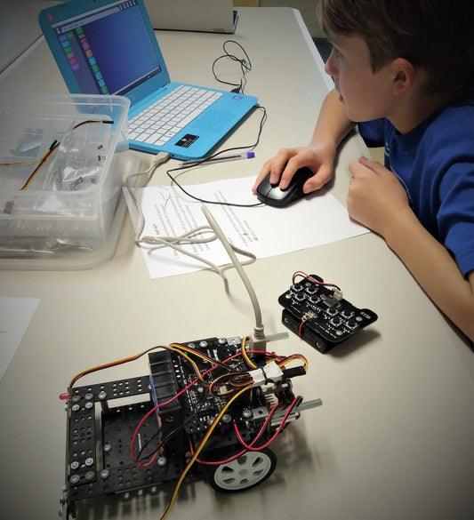 OMG! This is our rock star robotics student at the beginning of his journey. We are so proud we have such great students!